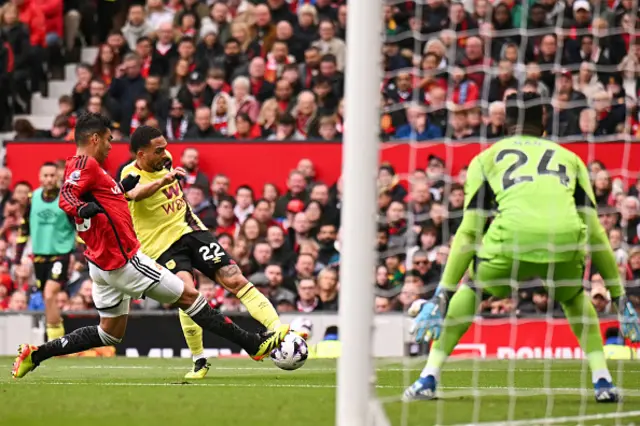 Vitinho fights for the ball with Manchester United's Brazilian midfielder Casemiro