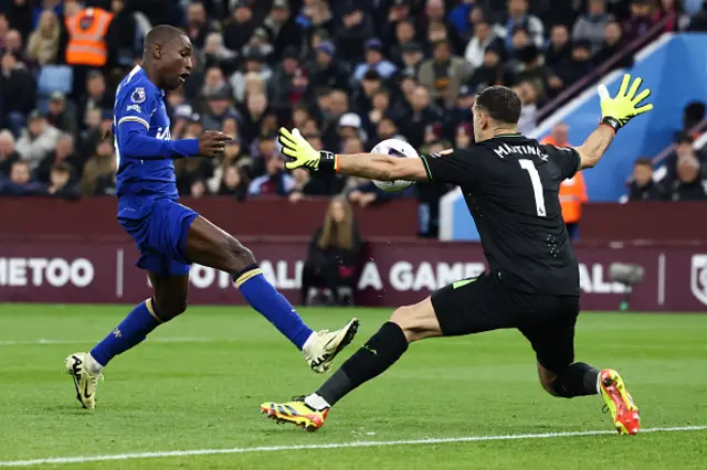 Nicolas Jackson scores a goal past Aston Villa's Emiliano Martinez