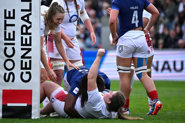 Maud Muir of England celebrates