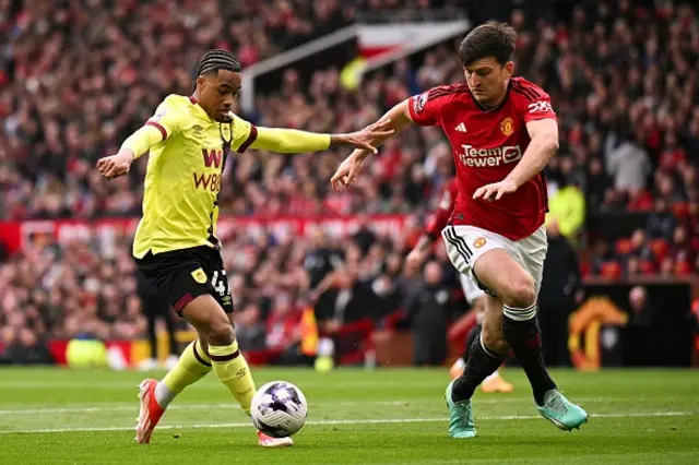 Wilson Odobert fights for the ball with Manchester United's English defender Harry Maguire