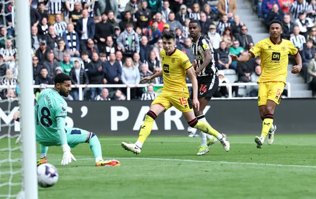 Alexander Isak of Newcastle United looks on as he scores his team's first goal