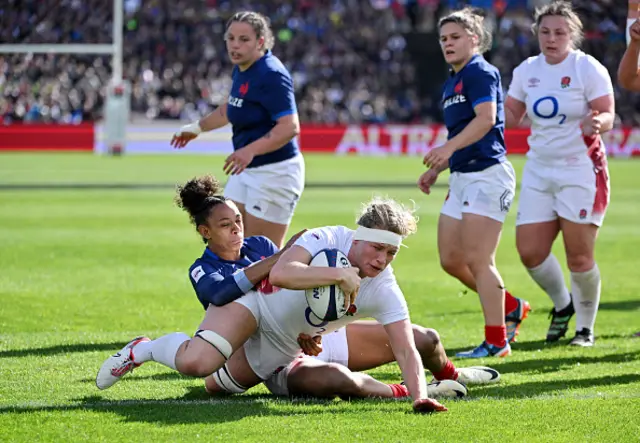 Alex Matthews of England scores her team's second try