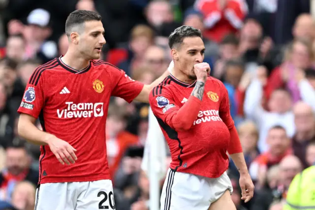 Antony celebrates his goal with a pregnancy announcement