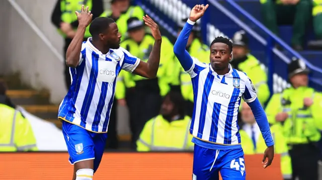 Anthony Musaba celebrates scoring