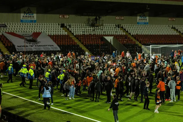 Dundee United fans treated themselves to another pitch invasion last night