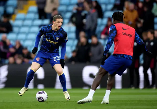 Conor Gallagher warms up for Chelsea