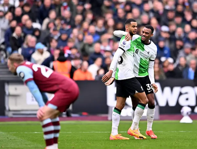 Cody Gakpo of Liverpool celebrates with Ryan Gravenberch