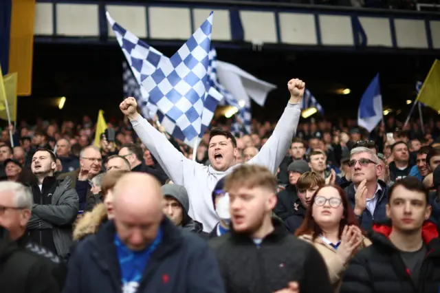 Everton fans cheer before kick off