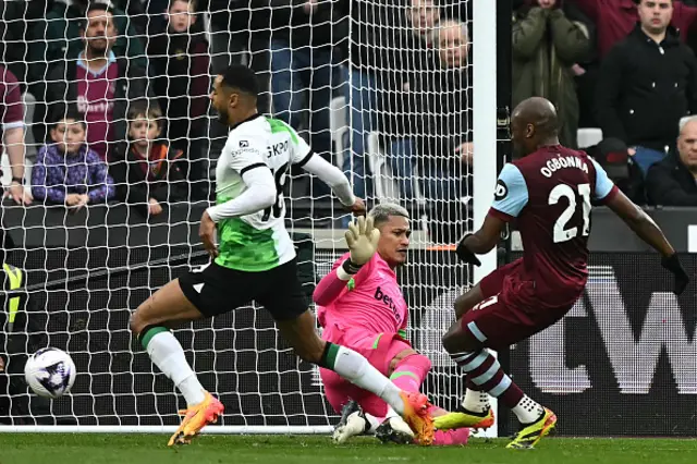 Alphonse Areola fouls Liverpool's Dutch striker Cody Gakpo