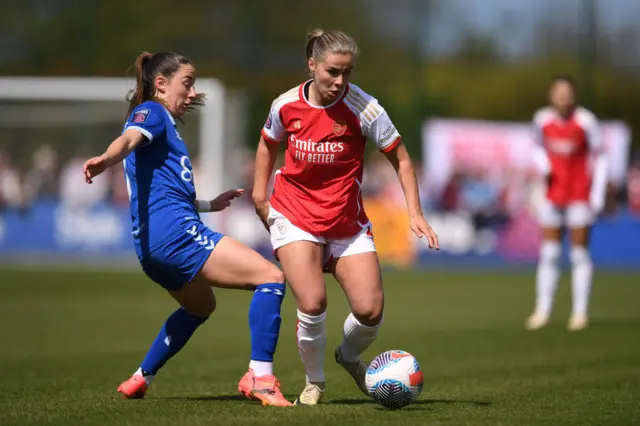 Victoria Pelova of Arsenal is challenged by Clare Wheeler