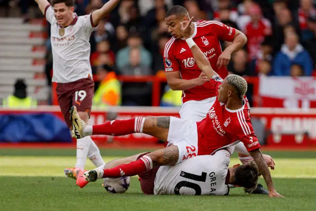 Danilo and Murillo of Nottingham Forest and Jack Grealish of Manchester City challenge