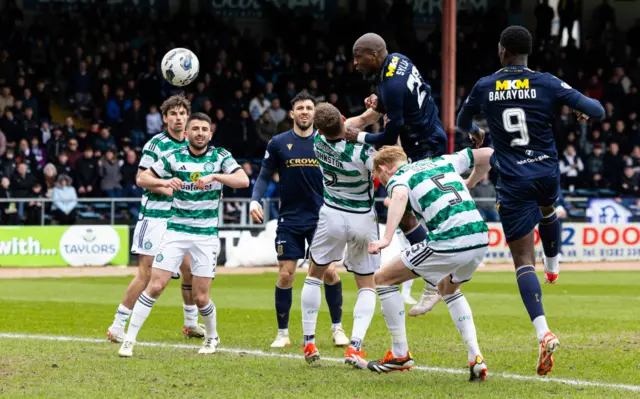 Dundee's Mo Sylla has a shot off target during a cinch Premiership match between Dundee and Celtic at Scot Foam Stadium at Dens Park, on April 28, 2024, in Dundee, Scotland.