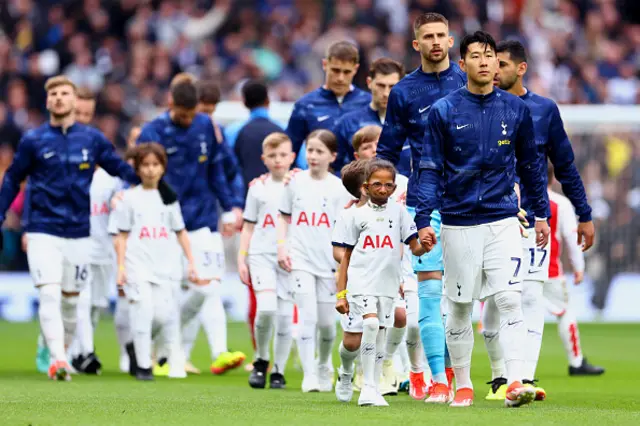 : Son Heung-Min of Tottenham Hotspur leads the team out