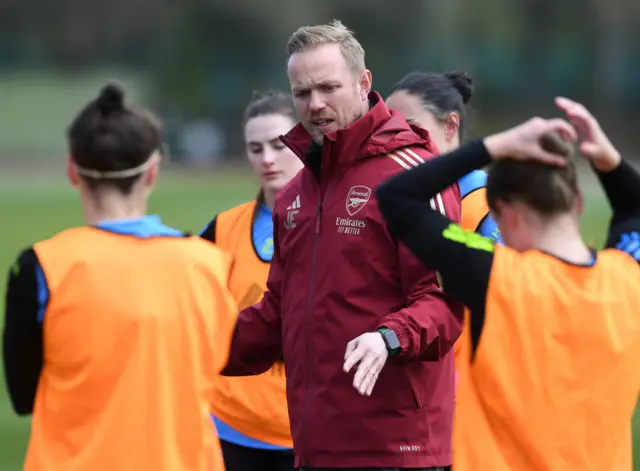 Jonas Eidevall gives out instructions in Arsenal training.