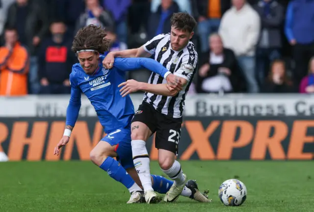 St Mirren's Ryan Strain and Rangers' Fabio Silva in action during a cinch Premiership match between St Mirren and Rangers at SMiSA Stadium, on April 28, 2024, in Paisley, Scotland.