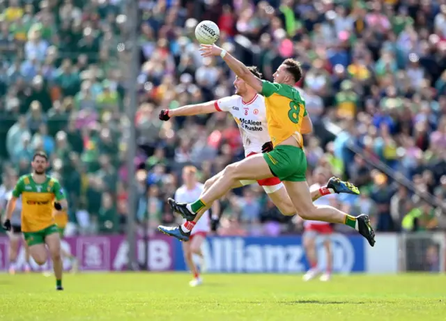 Donegal's Jason McGee and Brian Kennedy battle for the high ball