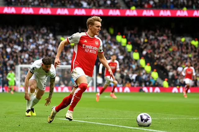 Martin Odegaard of Arsenal runs with the ball