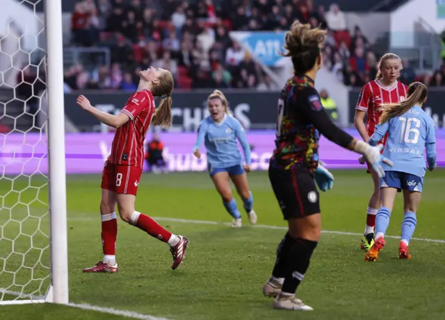 Bristol City's Amy Rodgers looks dejected after scoring an own goal and third for Manchester City.