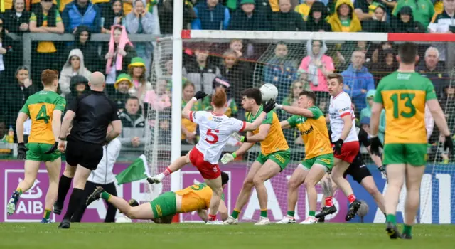 Sean O'Donnell of Tyrone has a shot on goal blocked