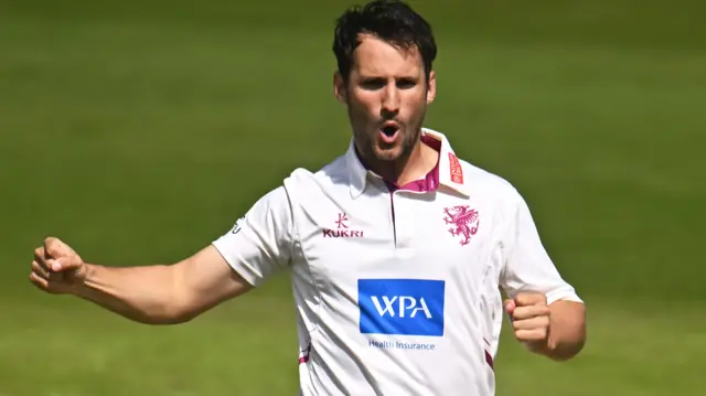 Lewis Gregory celebrates a wicket