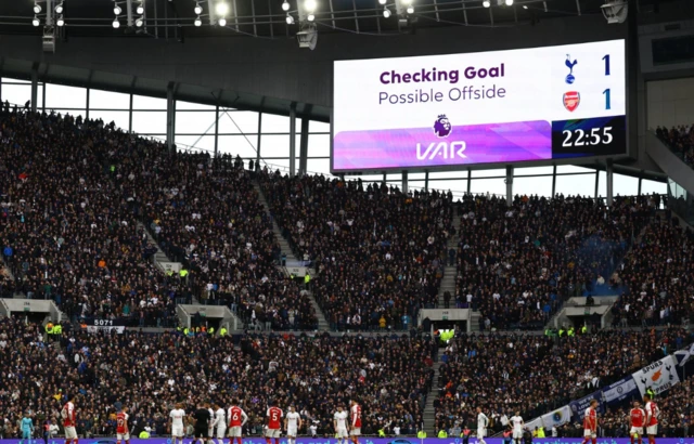 General view of the big screen during a VAR review before Tottenham Hotspur's Micky van de Ven goal is disallowed