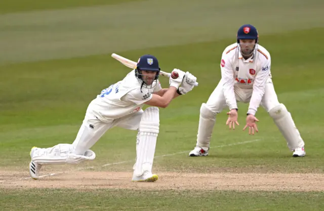 Durham batter Colin Ackermann drives for runs