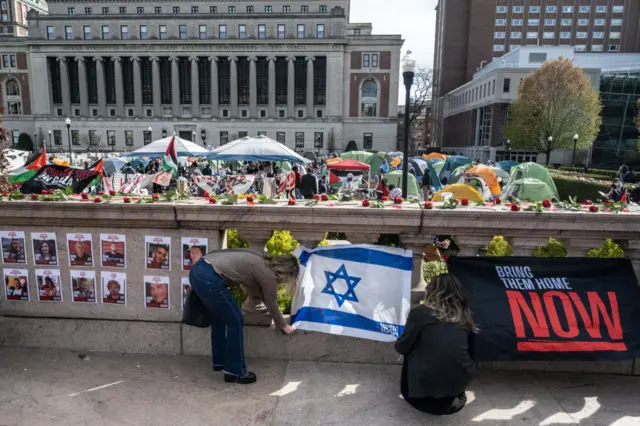 Students setting up an Israeli flag near Columbia