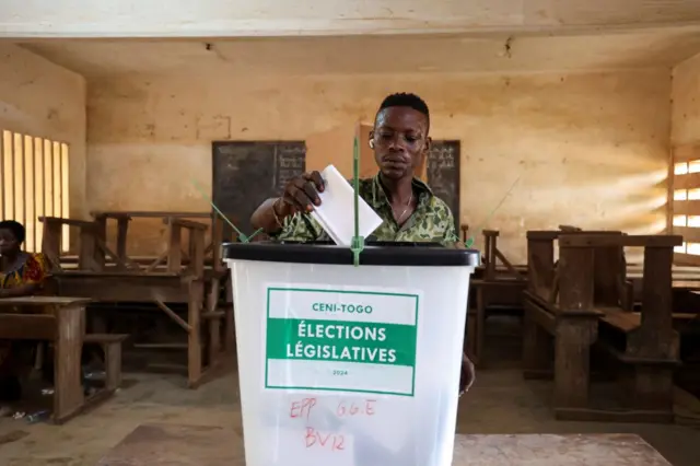 A man casts his ballot during the Togo’s parliamentary and regional elections in Lome, Togo April 29, 2024.