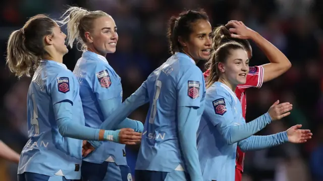 Manchester City players celebrate