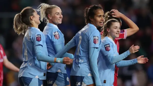 Manchester City players celebrate