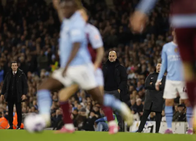 Guardiola watches on