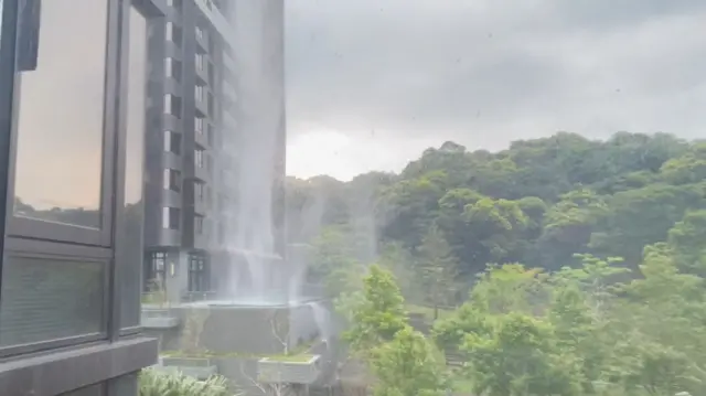 Debris falls from a building during an earthquake in Taiwan