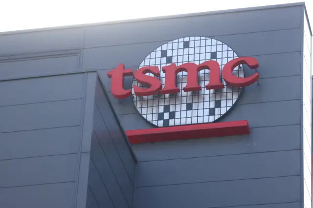 TSMC logo on building.