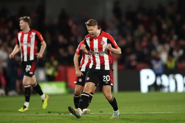 Ajer celebrates his goal v United