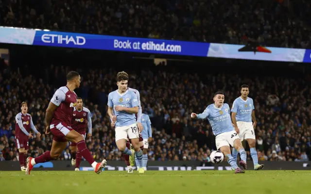 Foden shoots from the edge of the box