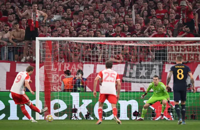 Kane slots the penalty in to give Bayern the lead