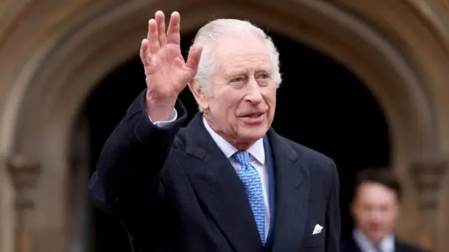 King Charles waves to crowds after an Easter Sunday service