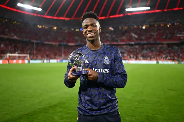 Vinicius poses with his POTM trophy