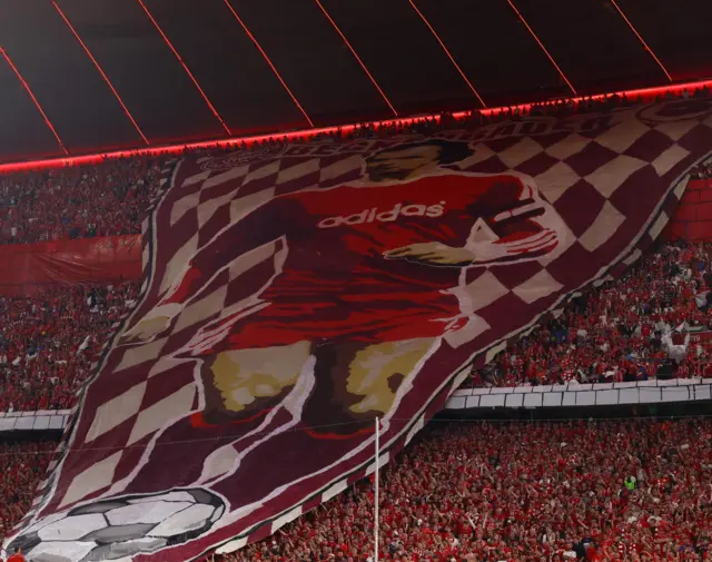 Bayern fans unveil a tifo of Franz Beckenbauer