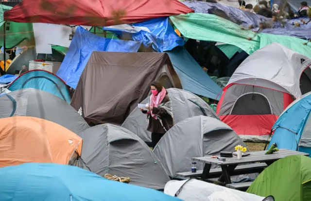 Pro-Palestinian student protestors and activists gather at an encampment on the campus of McGill University in Montreal, Canada, on April 29, 2024.