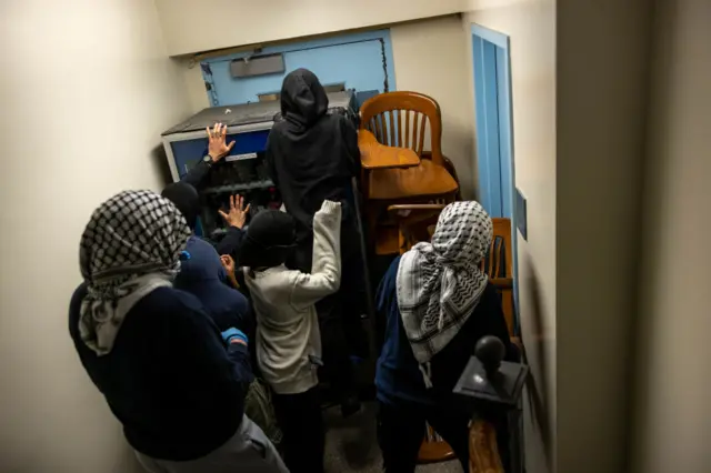 Demonstrators supporting Palestinians in Gaza barricade themselves inside Hamilton Hall, an academic building which has been occupied in past student movements, on April 30, 2024 in New York City.