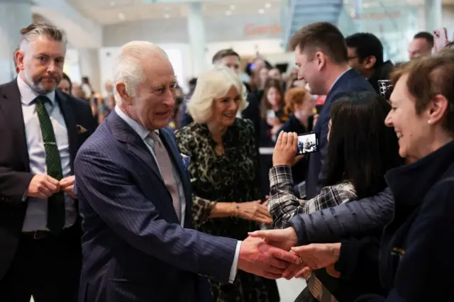 The King and Queen greet people at the Macmillan cancer centre