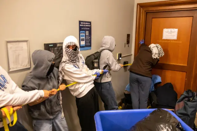 Demonstrators supporting Palestinians in Gaza barricade themselves inside Hamilton Hall, an academic building which has been occupied in past student movements, on April 30, 2024 in New York City.