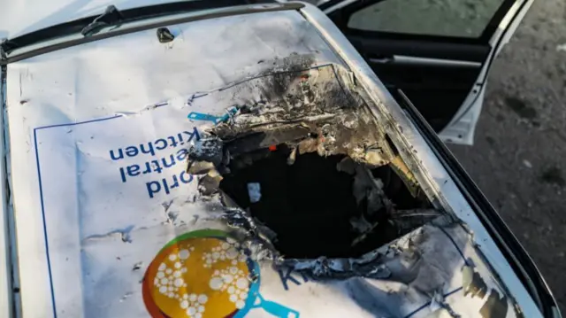 An image showing damage to a World Central Kitchen vehicle, which was hit by an Israeli airstrike