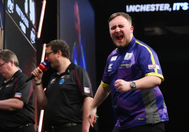 Luke Littler celebrates