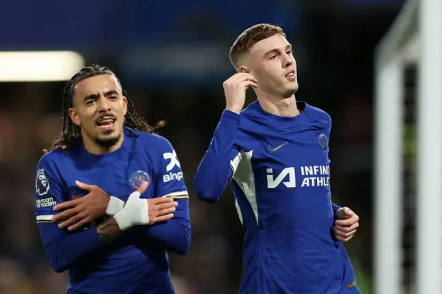 Cole Palmer celebrates with Malo Gusto