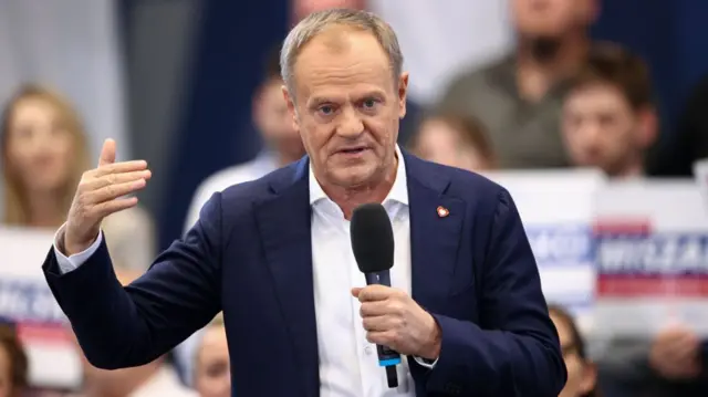 Polish Prime Minister Donald Tusk speaks at an open campaign meeting for the local elections in Krakow