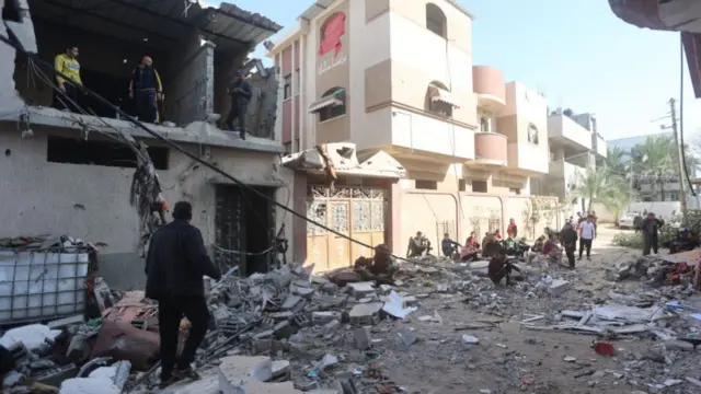 Palestinians inspect rubble after an Israeli attack on Jenin neighborhood in Rafah, Gaza