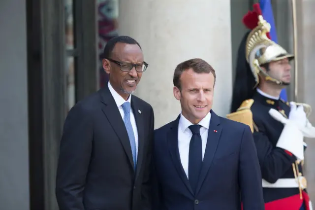 French President Emmanuel Macron (R) welcomes the President of Rwanda Paul Kagame (L) for a meeting at Elysee Palace on May 23, 2018 in Paris, France.