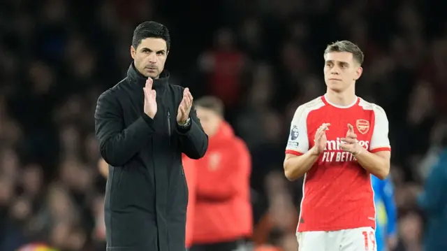 Manager Mikel Arteta applauds the Arsenal fans